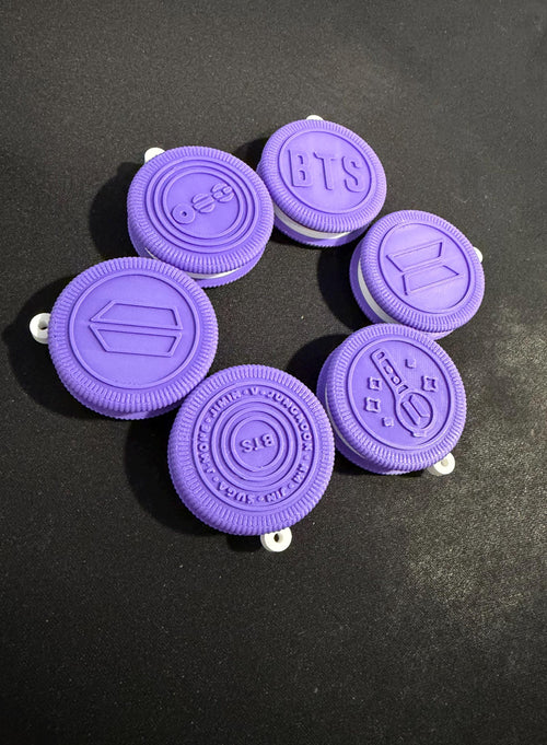3D printed sandwich cookie keychain with pressed pattern and metal split ring