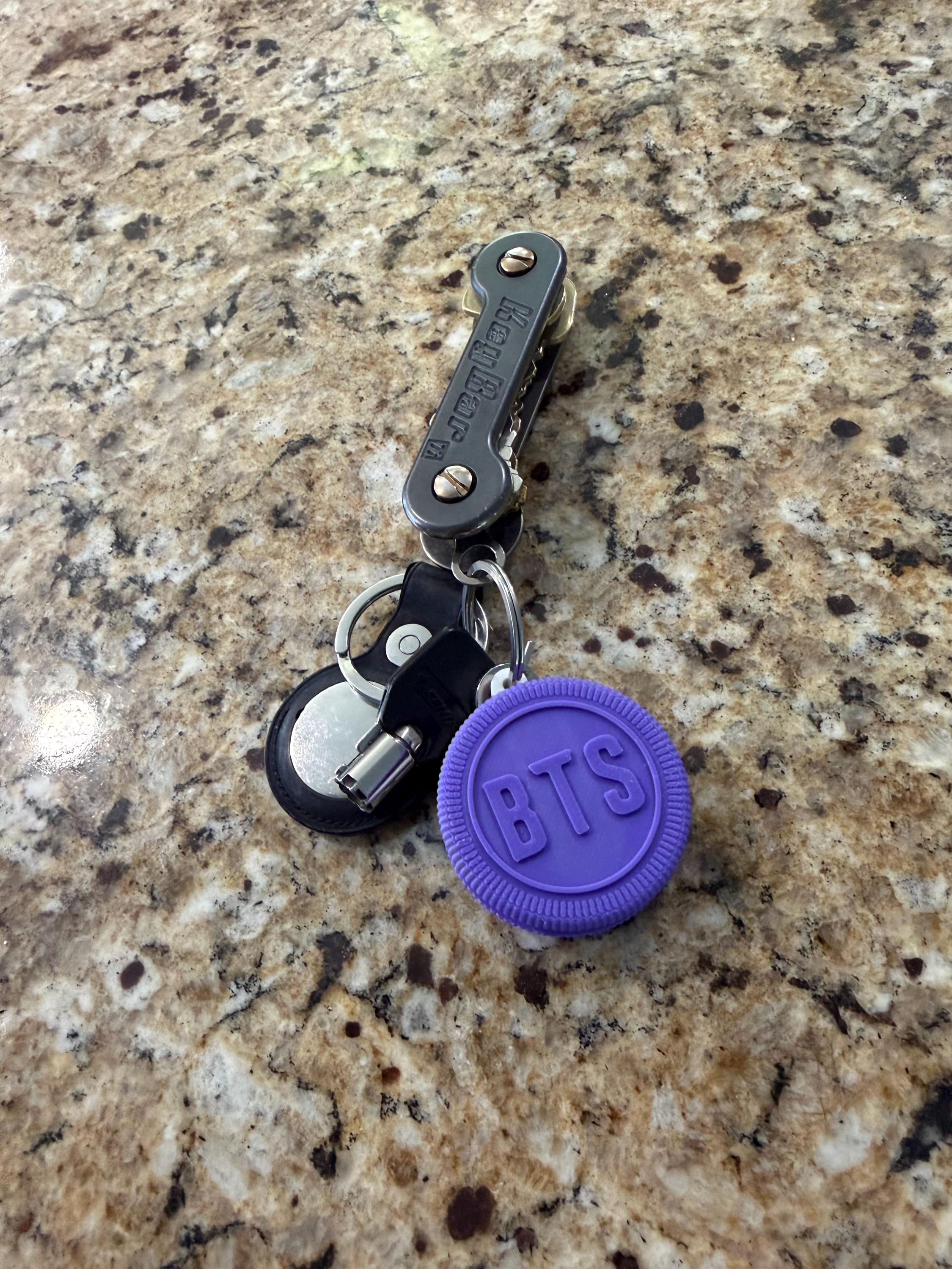 Cookie keychains with assorted KPOP-inspired designs