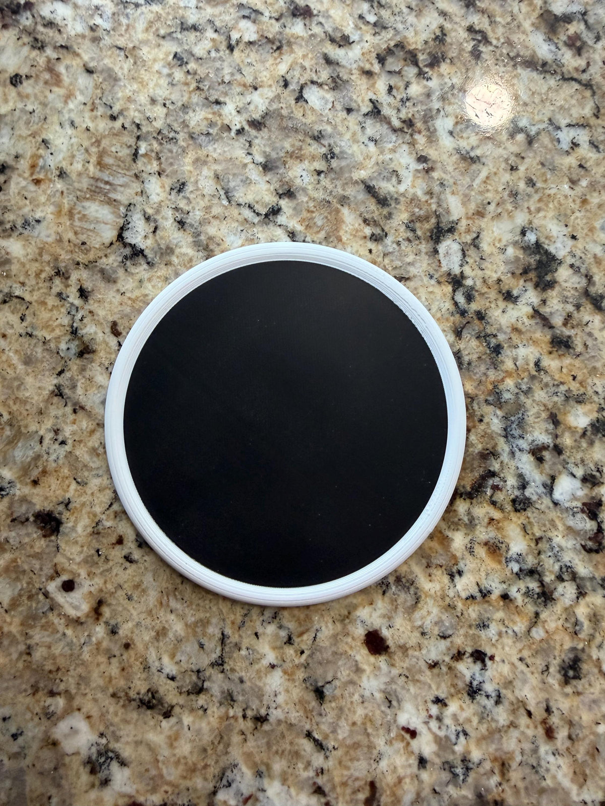 Stack of mixed-pattern 3D printed coasters