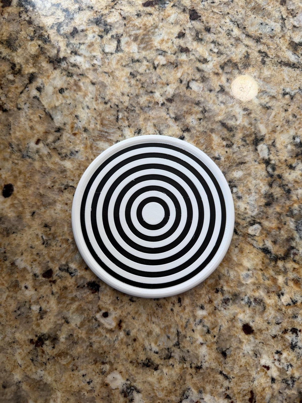 Two-tone crescent pattern coaster