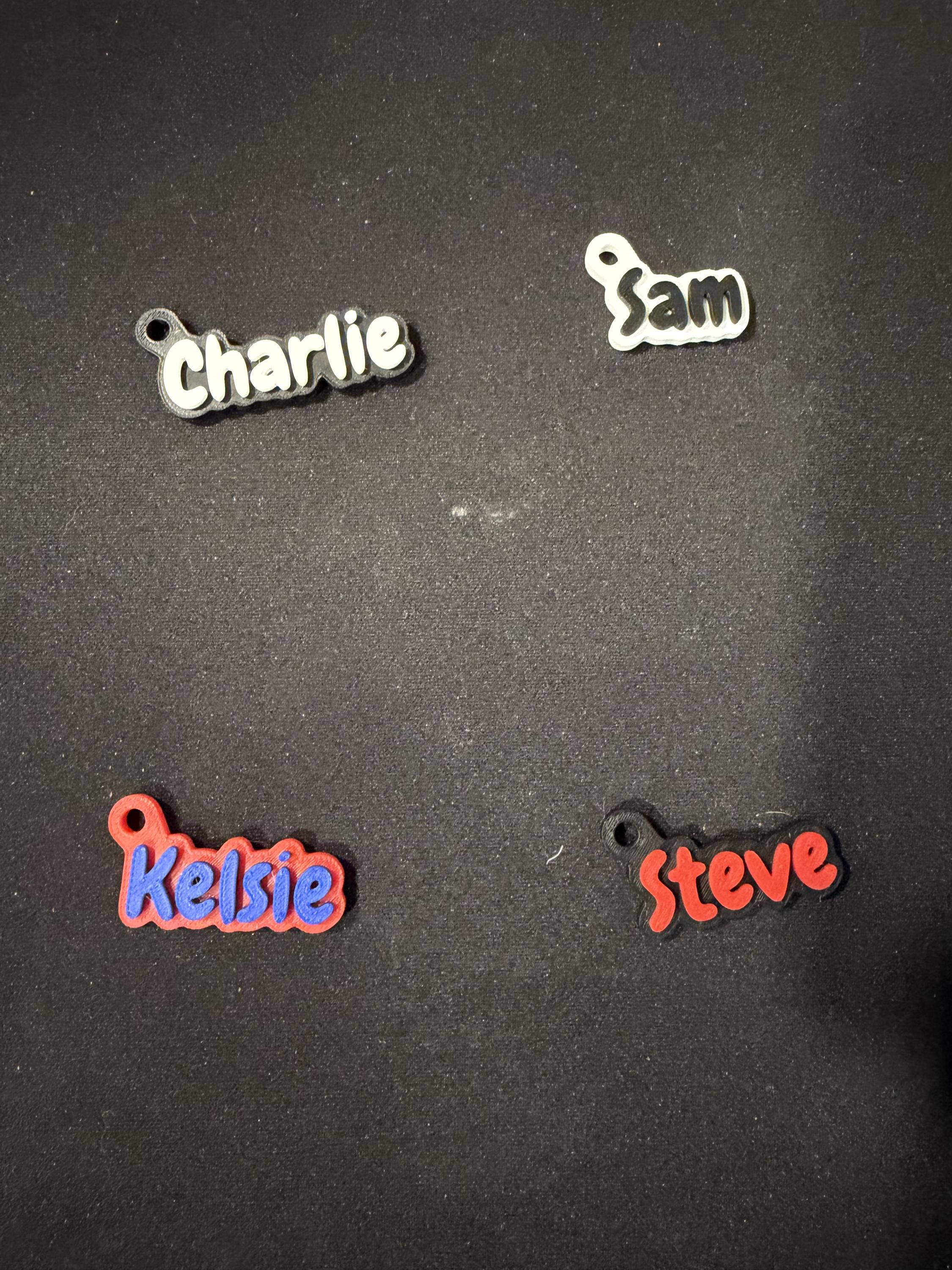 Personalized name keychains in assorted color combinations