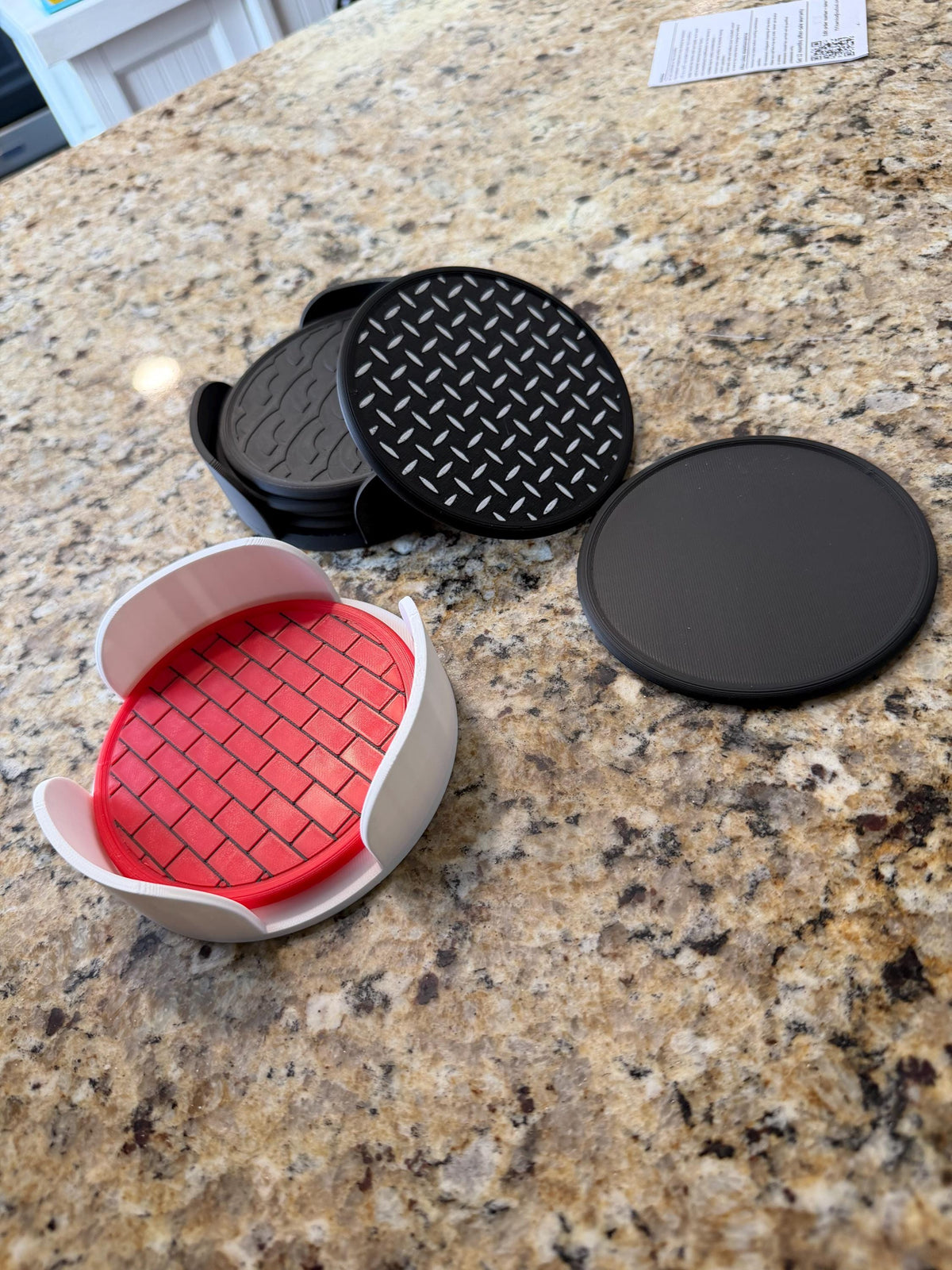 Coaster set in holder on a wooden table