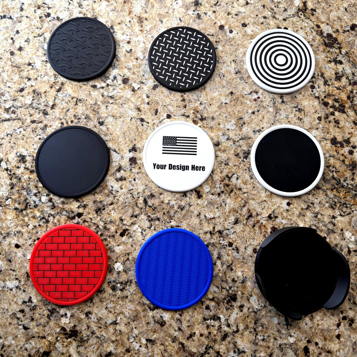 Set of four 3D printed textured coasters with matching holder